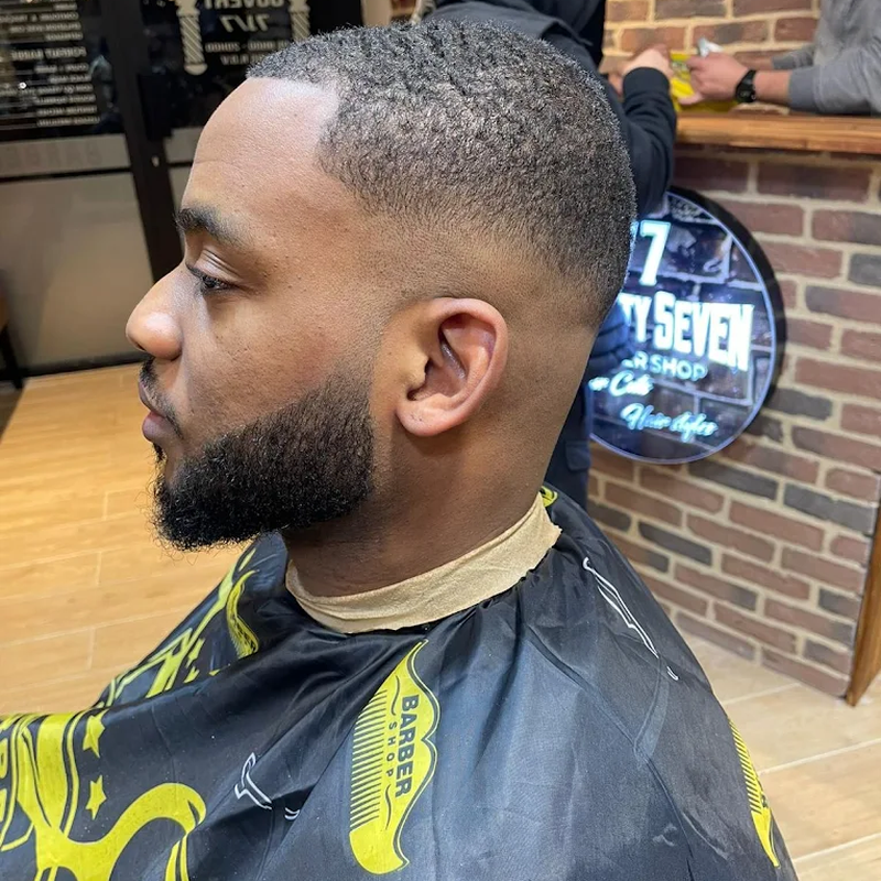 Réalisation coupe dégradé afro
